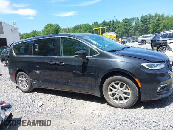 2023 Chrysler Pacifica Touring L with VIN 2C4RC1BG2PR534194, listed as a IAAI auction lot 42613934 with 69,896 mi miles and . Bid and sale history available at DreamBid. Image 13.