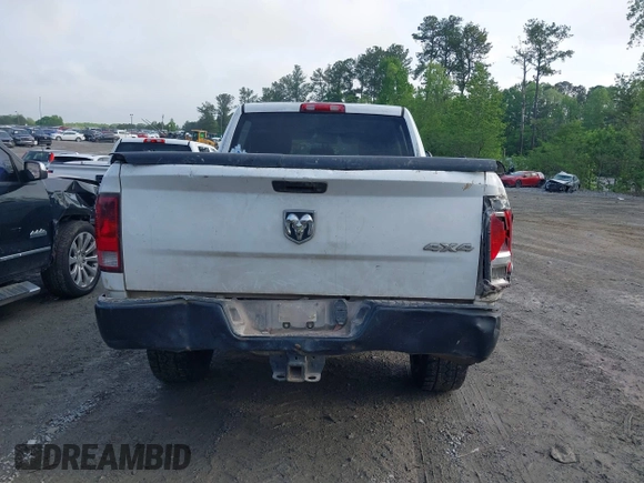 2015 Ram 2500 Tradesman with VIN 3C6TR5CT1FG628313, listed as a IAAI auction lot 42105431 with 306,368 mi miles and . Bid and sale history available at DreamBid. Image 16.