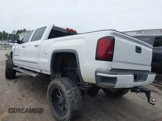 2017 GMC Sierra 2500HD Denali with VIN 1GT12UEG3HF117771, listed as a IAAI auction lot 42334696 with 140,999 mi miles and . Bid and sale history available at DreamBid. Image 3.