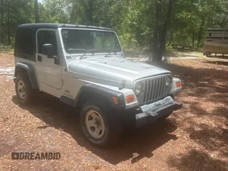 2005 Jeep Wrangler Sport with VIN 1J4F449SX5P387014, listed as a Copart auction lot 63908675 with 189,649 mi miles and Clean title. Bid and sale history available at DreamBid. Image 1.