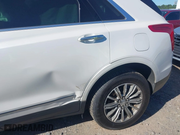 2017 Cadillac XT5 Luxury FWD with VIN 1GYKNBRS1HZ304062, listed as a IAAI auction lot 42460981 with 77,310 mi miles and . Bid and sale history available at DreamBid. Image 6.