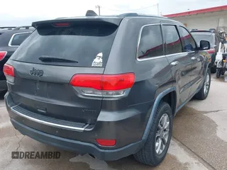 2014 Jeep Grand Cherokee Limited with VIN 1C4RJFBG4EC227165, listed as a IAAI auction lot 42135232 with 105,873 mi miles. Bid and sale history available at carsss.com. Image 4.