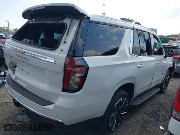 2023 Chevrolet Tahoe LS with VIN 1GNSCMKD5PR240763, listed as a IAAI auction lot 41931972 with 17,939 mi miles and . Bid and sale history available at DreamBid. Image 4.