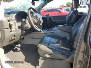 2004 Nissan Titan LE with VIN 1N6AA07B24N575053, listed as a Copart auction lot 50370985 with 230,225 mi miles and Salvage title. Bid and sale history available at DreamBid. Image 7.