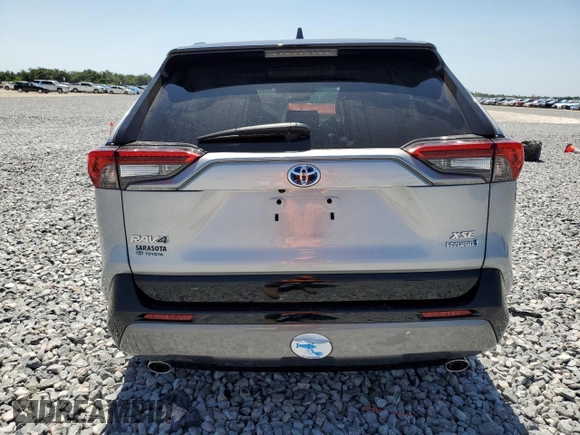 2021 Toyota RAV4 Hybrid XSE with VIN 2T3E6RFV4MW017302, listed as a Copart auction lot 57397275 with 15,544 mi miles and Salvage title. Bid and sale history available at DreamBid. Image 6.