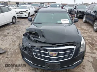 2018 Cadillac ATS RWD z VIN 1G6AA5RX7J0183805, wystawiony jako IAAI lot #41398076 z przebiegiem 103 784 mil mil oraz . Historia ofert i sprzedaży dostępna na DreamBid. Obrazek 12.