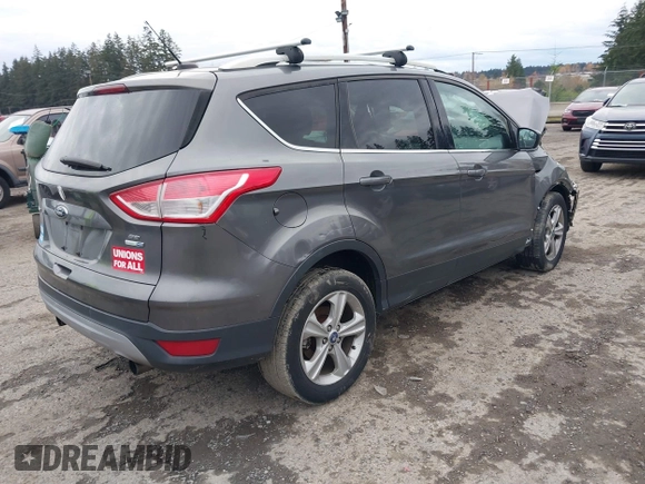 2013 Ford Escape SE with VIN 1FMCU9G92DUA54761, listed as a IAAI auction lot 41105062 with 131,767 mi miles. Bid and sale history available at carsss.com. Image 4.