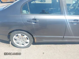 2009 Honda Civic LX z VIN 19XFA165X9E039697, wystawiony jako IAAI lot #39794063 z przebiegiem 169 439 mil mil oraz . Historia ofert i sprzedaży dostępna na DreamBid. Obrazek 6.