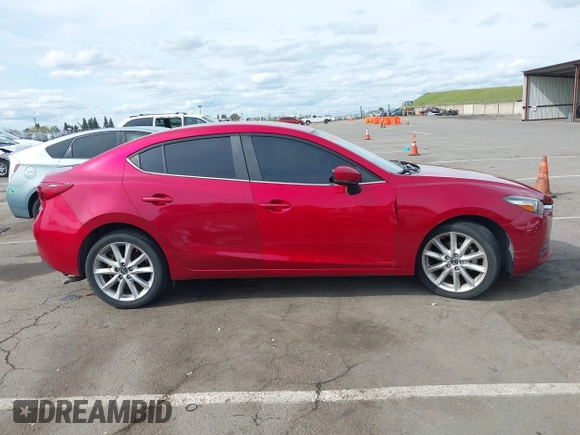 2017 Mazda 3 Touring with VIN 3MZBN1V79HM129043, listed as a IAAI auction lot 41970009 with 142,654 mi miles and . Bid and sale history available at DreamBid. Image 13.
