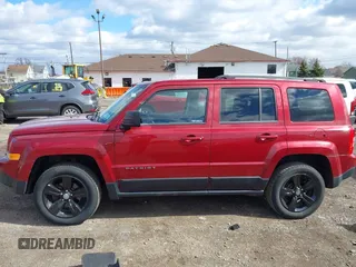 2014 Jeep Patriot Latitude with VIN 1C4NJRFB4ED897890, listed as a IAAI auction lot 41978399 with 76,688 mi miles. Bid and sale history available at carsss.com. Image 14.