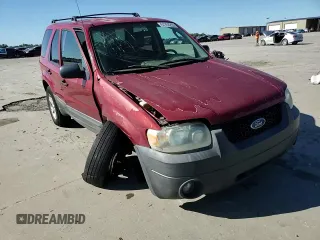 2005 Ford Escape XLT z VIN 1FMYU93185KE31449, wystawiony jako Copart lot #57763225 z przebiegiem 249 819 mil mil oraz Szkoda całkowita • Salvage title. Historia ofert i sprzedaży dostępna na DreamBid. Obrazek 14.