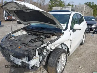2014 Mazda CX-5 Grand Touring with VIN JM3KE4DY0E0343777, listed as a IAAI auction lot 41464395 with 126,214 mi miles. Bid and sale history available at carsss.com. Image 6.