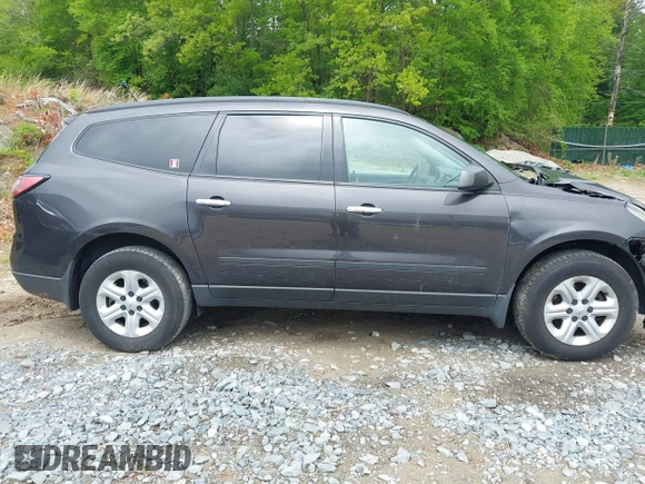 2015 Chevrolet Traverse LS z VIN 1GNKVFED2FJ133054, wystawiony jako IAAI lot #42252164 z przebiegiem 72 981 mil mil oraz . Historia ofert i sprzedaży dostępna na DreamBid. Obrazek 13.