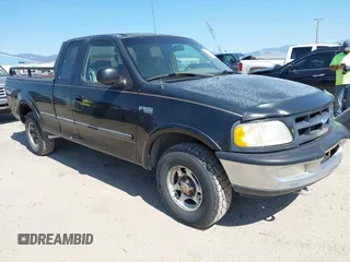 1997 Ford F-150 with VIN 2FTEX18L2VCA02676, listed as a IAAI auction lot 42756787 with 223,892 mi miles and . Bid and sale history available at DreamBid. Image 1.