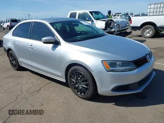 2014 Volkswagen Jetta Sedan SE w/Connectivity/Sunroof PZEV with VIN 3VWD17AJ0EM396804, listed as a IAAI auction lot 41830977 with 141,690 mi miles. Bid and sale history available at carsss.com. Image 1.