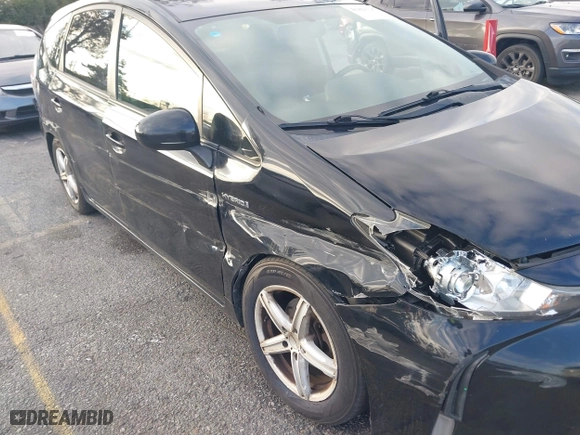 2017 Toyota Prius v Two with VIN JTDZN3EU1HJ066102, listed as a IAAI auction lot 41429125 with 168,152 mi miles. Bid and sale history available at carsss.com. Image 6.
