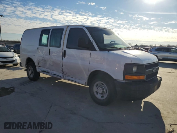 2014 Chevrolet Express Cargo Van with VIN 1GCWGFCA2E1213790, listed as a Copart auction lot 85323294 with 299,946 mi miles and Salvage Title. Bid and sale history available at carsss.com. Image 4.