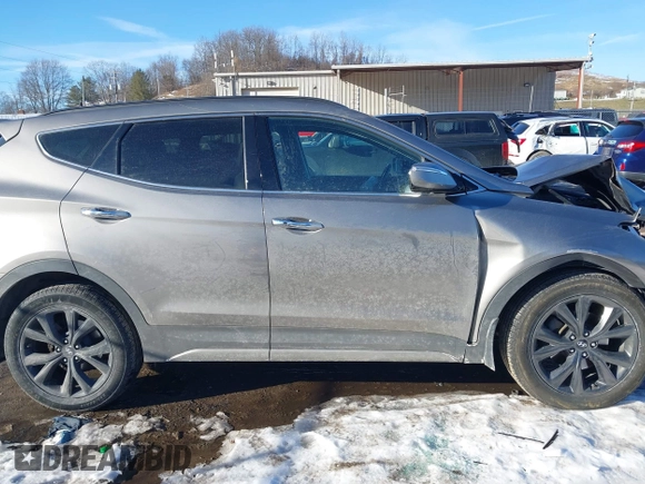 2018 Hyundai Santa Fe Ultimate with VIN 5XYZWDLA2JG570515, listed as a IAAI auction lot 41427397 with 67,135 mi miles and . Bid and sale history available at DreamBid. Image 13.