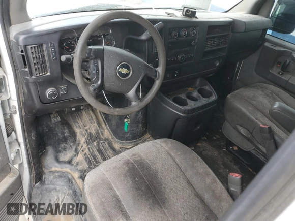 2012 Chevrolet Express Cargo z VIN 1GCWGFCAXC1177408, wystawiony jako Copart lot #64615955 z przebiegiem Nie podano mil oraz Czysty tytuł • Clean title. Historia ofert i sprzedaży dostępna na DreamBid. Obrazek 8.