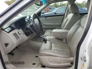 2011 Cadillac DTS z VIN 1G6KA5E61BU104530, wystawiony jako Copart lot #74100794 z przebiegiem 167 373 mil mil oraz Szkoda całkowita • Salvage title. Historia ofert i sprzedaży dostępna na DreamBid. Obrazek 7.