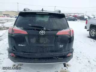 2018 Toyota RAV4 XLE with VIN 2T3RFREV8JW851250, listed as a IAAI auction lot 41164994 with 63,005 mi miles. Bid and sale history available at carsss.com. Image 16.