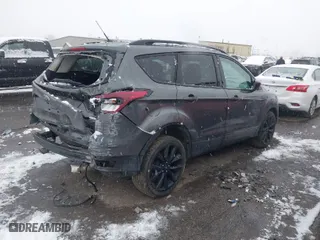 2017 Ford Escape SE with VIN 1FMCU9G99HUE78637, listed as a IAAI auction lot 41152042 with 84,635 mi miles. Bid and sale history available at carsss.com. Image 4.