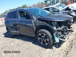 2017 Honda CR-V Touring with VIN 2HKRW1H90HH503380, listed as a IAAI auction lot 41823300 with 254,402 mi miles. Bid and sale history available at carsss.com. Image 1.