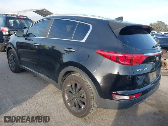 2018 Kia Sportage EX with VIN KNDPN3AC5J7427306, listed as a IAAI auction lot 41598354 with 46,829 mi miles and . Bid and sale history available at DreamBid. Image 3.