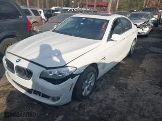 2012 BMW 5 Series 528i xDrive with VIN WBAXH5C57CDW06059, listed as a IAAI auction lot 41402225 with 167,656 mi miles. Bid and sale history available at carsss.com. Image 2.