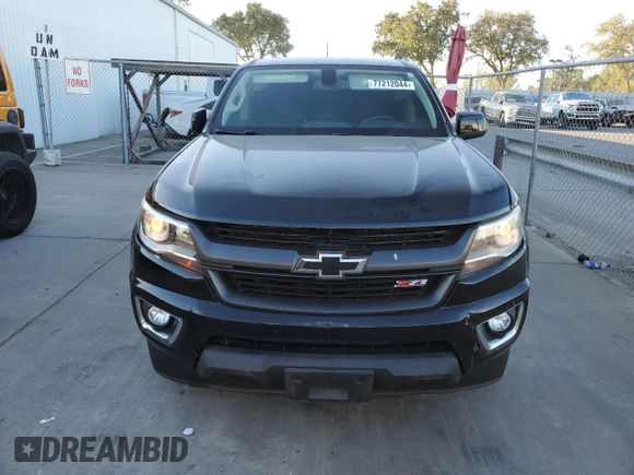 2019 Chevrolet Colorado 2WD Z71 with VIN 1GCGSDEN1K1314774, listed as a Copart auction lot 77212044 with 74,689 mi miles and Salvage Title. Bid and sale history available at carsss.com. Image 5.