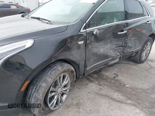 2021 Cadillac XT5 AWD Premium Luxury with VIN 1GYKNDRS7MZ168493, listed as a IAAI auction lot 41395162 with 33,064 mi miles. Bid and sale history available at carsss.com. Image 6.