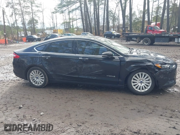 2015 Ford Fusion SE Hybrid with VIN 3FA6P0LU5FR190333, listed as a IAAI auction lot 41802327 with 256,747 mi miles. Bid and sale history available at carsss.com. Image 13.