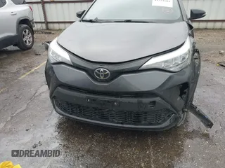 2021 Toyota C-HR LE with VIN JTNKHMBX0M1129080, listed as a IAAI auction lot 41321604 with 52,916 mi miles. Bid and sale history available at carsss.com. Image 12.