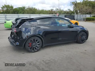 2023 Tesla Model Y Performance with VIN 7SAYGDEF8PF762915, listed as a Copart auction lot 50270285 with 23,893 mi miles and Salvage Title. Bid and sale history available at DreamBid. Image 3.