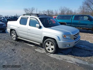 2009 Honda Ridgeline RTL with VIN 2HJYK16569H002832, listed as a IAAI auction lot 41683669 with 154,220 mi miles. Bid and sale history available at carsss.com. Image 1.