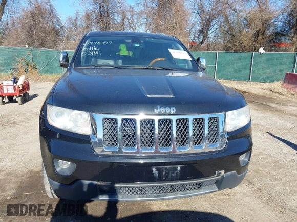 2011 Jeep Grand Cherokee Overland with VIN 1J4RS6GGXBC659349, listed as a IAAI auction lot 41778399 with 219,624 mi miles and . Bid and sale history available at DreamBid. Image 12.