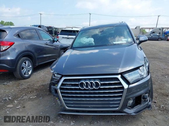 2018 Audi Q7 Prestige with VIN WA1VAAF75JD036199, listed as a IAAI auction lot 42557507 with 104,644 mi miles and . Bid and sale history available at DreamBid. Image 12.