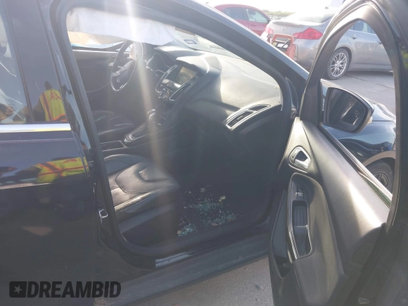 2016 Ford Focus Titanium with VIN 1FADP3J26GL335843, listed as a IAAI auction lot 42799795 with 167,506 mi miles and . Bid and sale history available at DreamBid. Image 5.