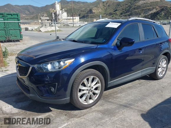 2014 Mazda CX-5 Grand Touring with VIN JM3KE2DY7E0376389, listed as a IAAI auction lot 42014946 with 126,081 mi miles. Bid and sale history available at carsss.com. Image 17.