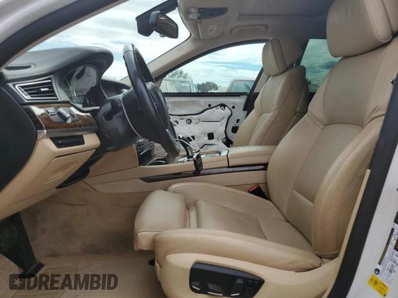 2013 BMW 7 Series 740i with VIN WBAYA6C58DC995137, listed as a Copart auction lot 75774104 with 61,847 mi miles and Salvage Title. Bid and sale history available at carsss.com. Image 7.