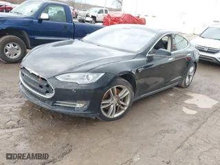 2013 Tesla Model S with VIN 5YJSA1CN8DFP26506, listed as a IAAI auction lot 41642194 with 160574 miles. Bid and sale history available at carsss.com. Image 18.