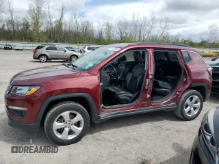 2020 Jeep Compass Latitude with VIN 3C4NJDBB6LT165048, listed as a Copart auction lot 56165965 with 83,351 mi miles and Salvage title. Bid and sale history available at DreamBid. Image 1.