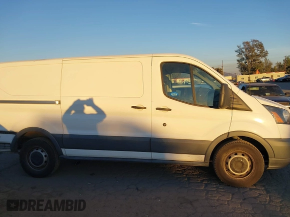 2016 Ford Transit Cargo with VIN 1FTYE1YM8GKA04717, listed as a IAAI auction lot 40878998 with 142,124 mi miles and . Bid and sale history available at DreamBid. Image 14.