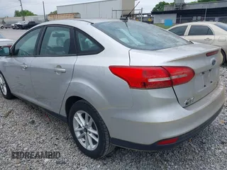 2015 Ford Focus SE with VIN 1FADP3FE4FL304169, listed as a IAAI auction lot 42148743 with 60,315 mi miles and . Bid and sale history available at carsss.com. Image 3.