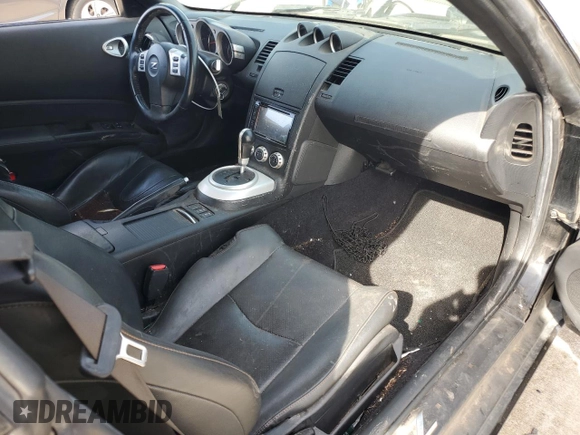 2007 Nissan 350Z with VIN JN1BZ34D97M504887, listed as a Copart auction lot 77140104 with 115,128 mi miles and Salvage Title. Bid and sale history available at DreamBid. Image 8.