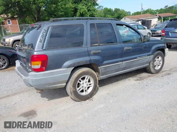 2002 Jeep Grand Cherokee Laredo with VIN 1J4GW48S92C150162, listed as a IAAI auction lot 42471732 with 171,677 mi miles and . Bid and sale history available at DreamBid. Image 4.