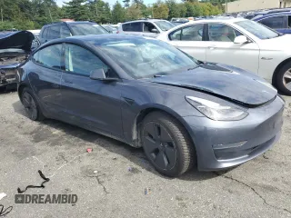 2022 Tesla Model 3 Long Range with VIN 5YJ3E1EB8NF182876, listed as a Copart auction lot 72987614 with Not Provided miles and Salvage Title. Bid and sale history available at DreamBid. Image 4.