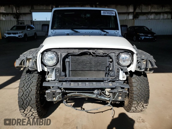 2018 Jeep Wrangler JK Unlimited Sahara with VIN 1C4HJWEG8JL938031, listed as a Copart auction lot 69769394 with 80,417 mi miles and Salvage Title. Bid and sale history available at carsss.com. Image 5.