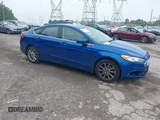 2017 Ford Fusion SE z VIN 3FA6P0HD7HR169656, wystawiony jako IAAI lot #42290093 z przebiegiem 137 607 mil mil oraz . Historia ofert i sprzedaży dostępna na DreamBid. Obrazek 1.