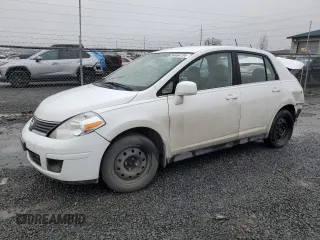 2007 Nissan Versa 1.8 SL with VIN 3N1BC11E67L402475, listed as a Copart auction lot 84464734 with 62,399 mi miles and Salvage Title. Bid and sale history available at carsss.com. Image 1.